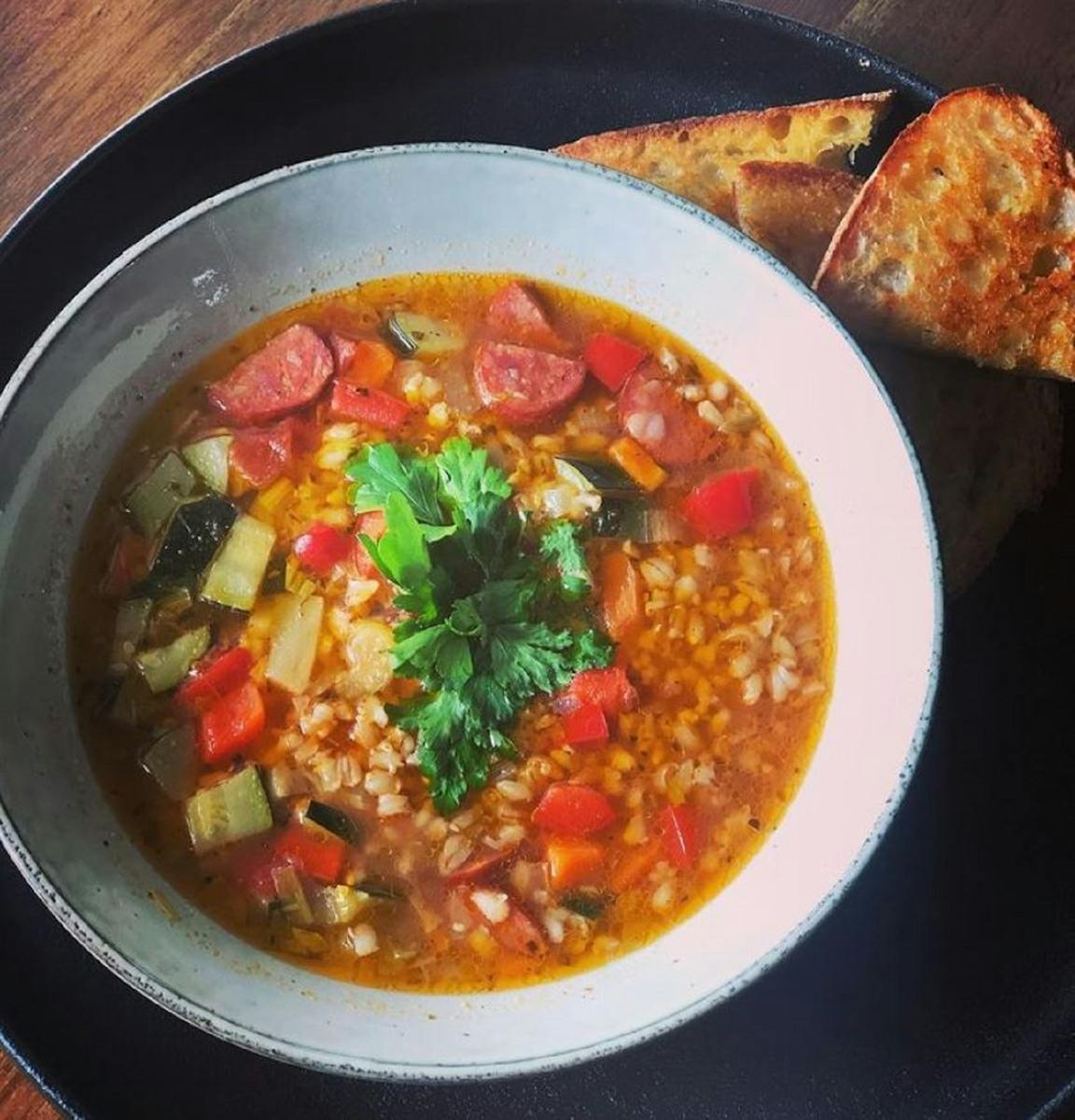 Small bowl of soup and bread