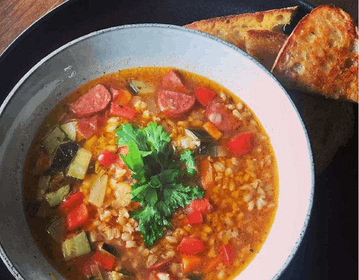 Small bowl of soup and bread