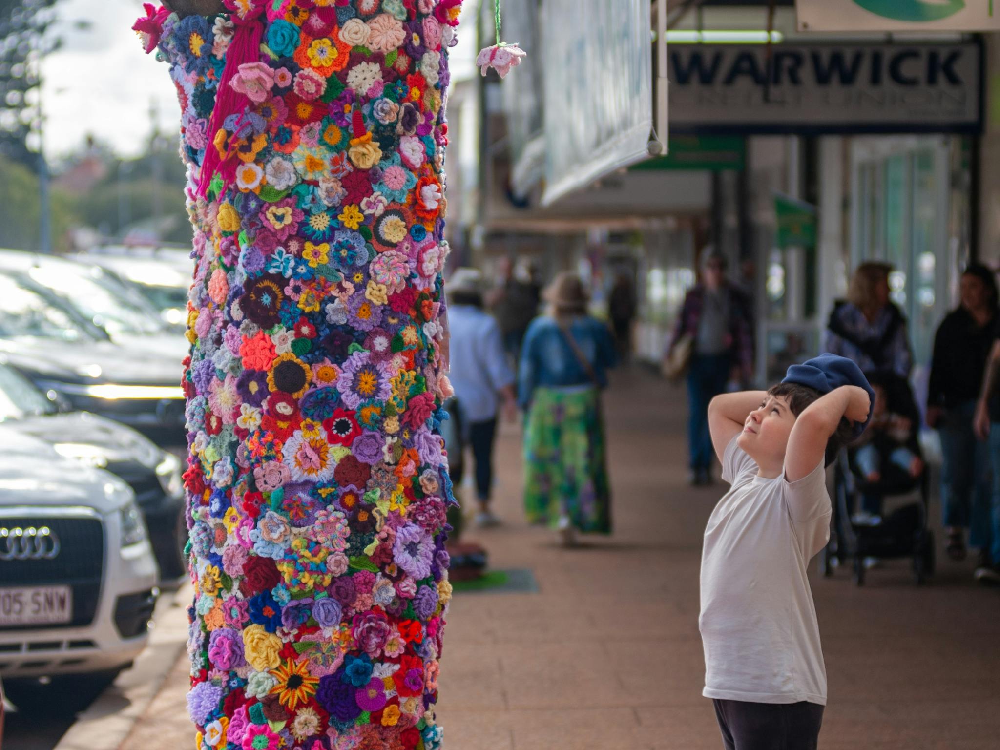 Child enjoying the wonder of the Tree Jumper installation