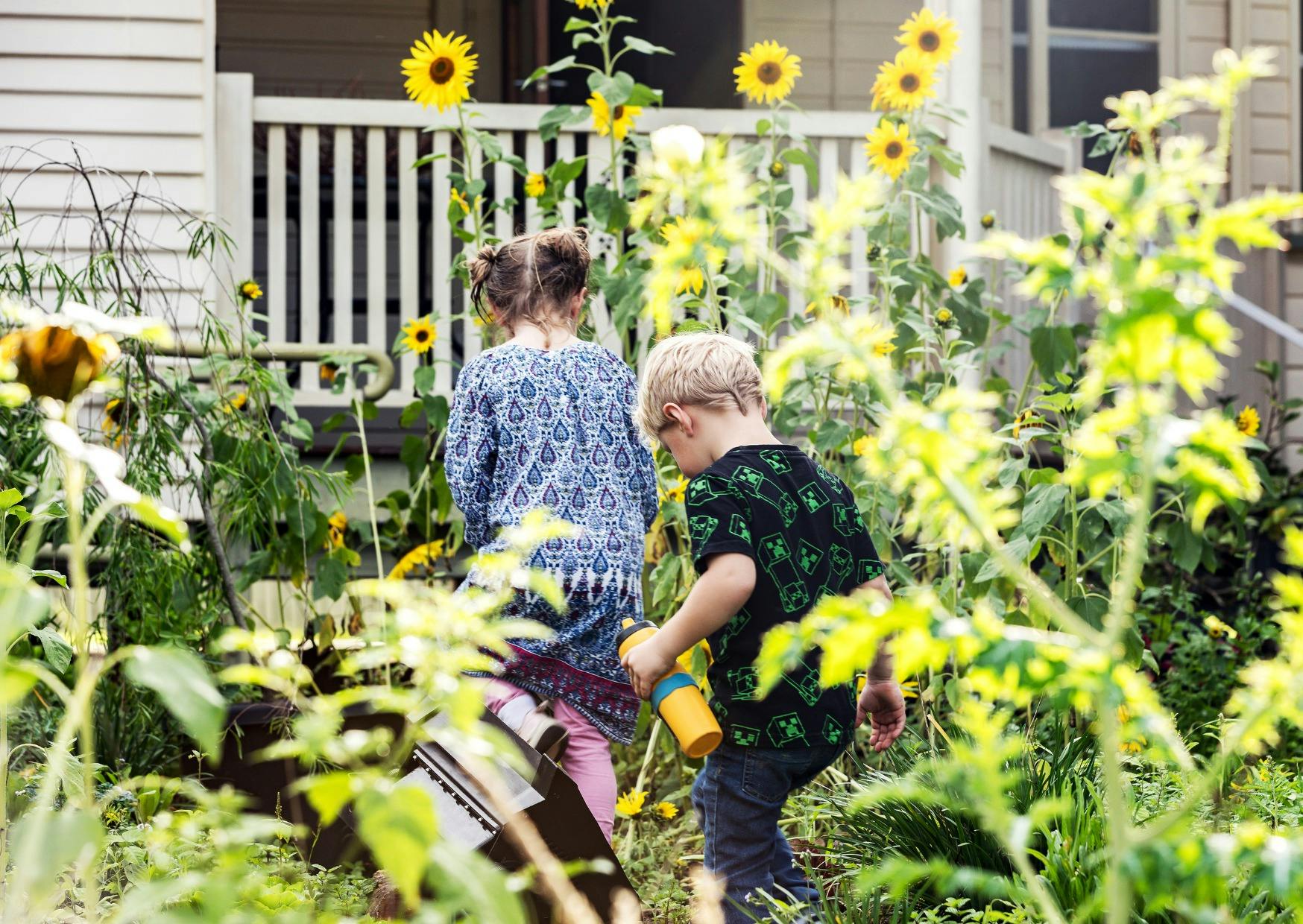 Kids play in the restaurant gardens. The Flack Family tend their extensive Australian native foods.