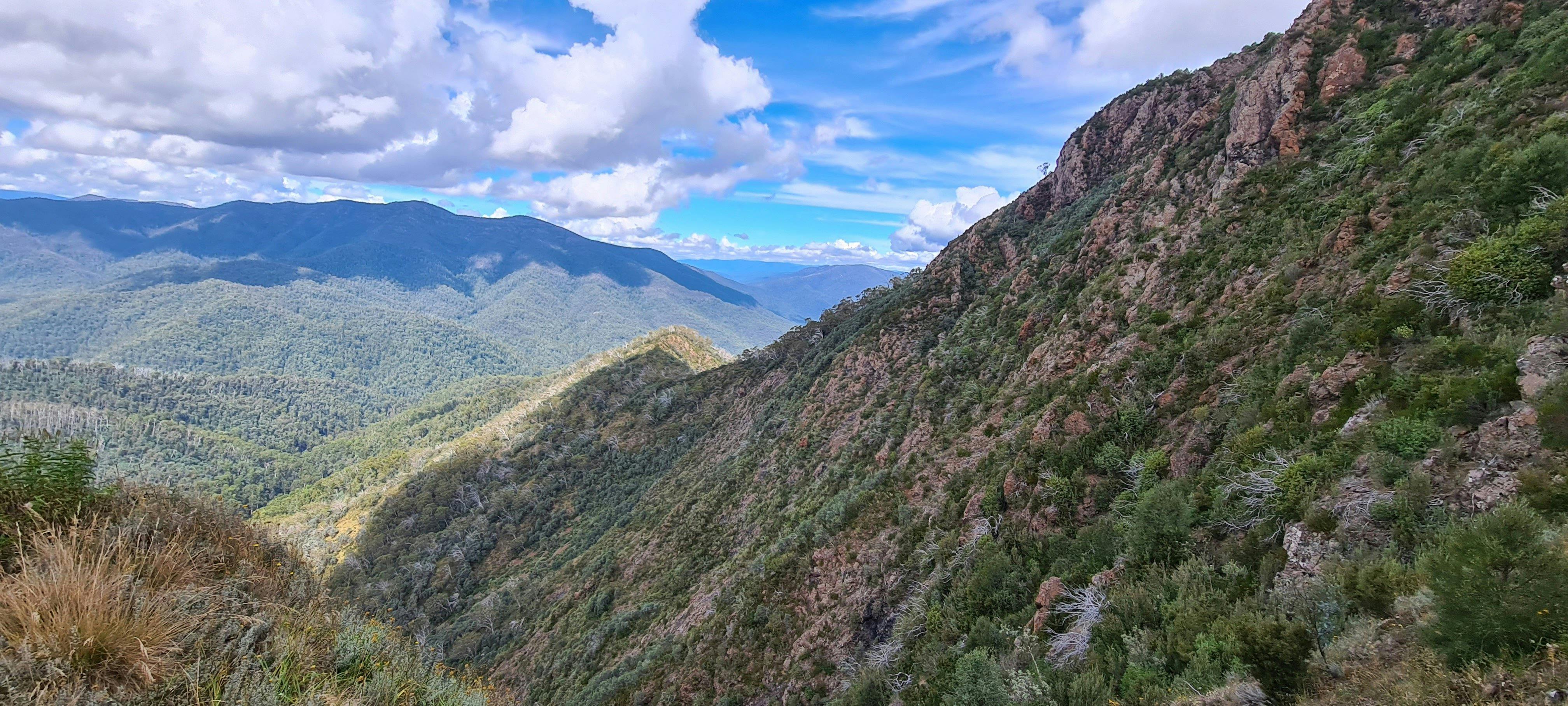 Looking South across the mountains from the saddle below the scree slope.