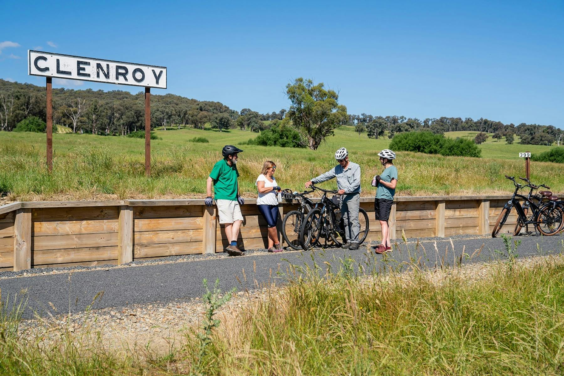 Cyclists chatting as they take a break at Glenroy Station.