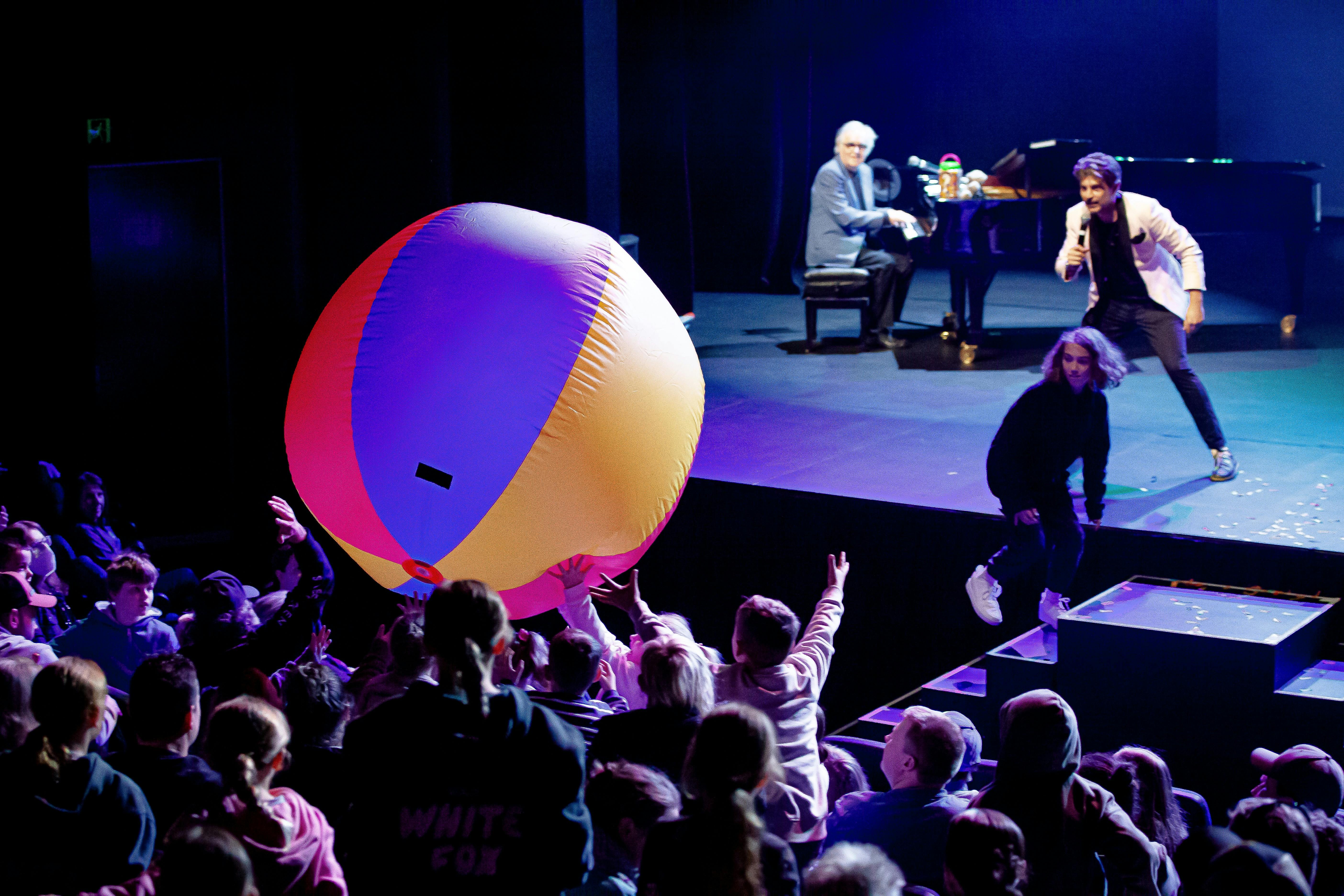 gigantic ball flying into the audience