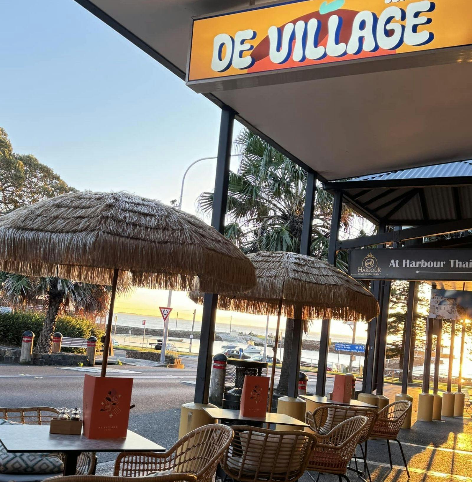 Outside De Village Cafe with Shellharbour harbour in background