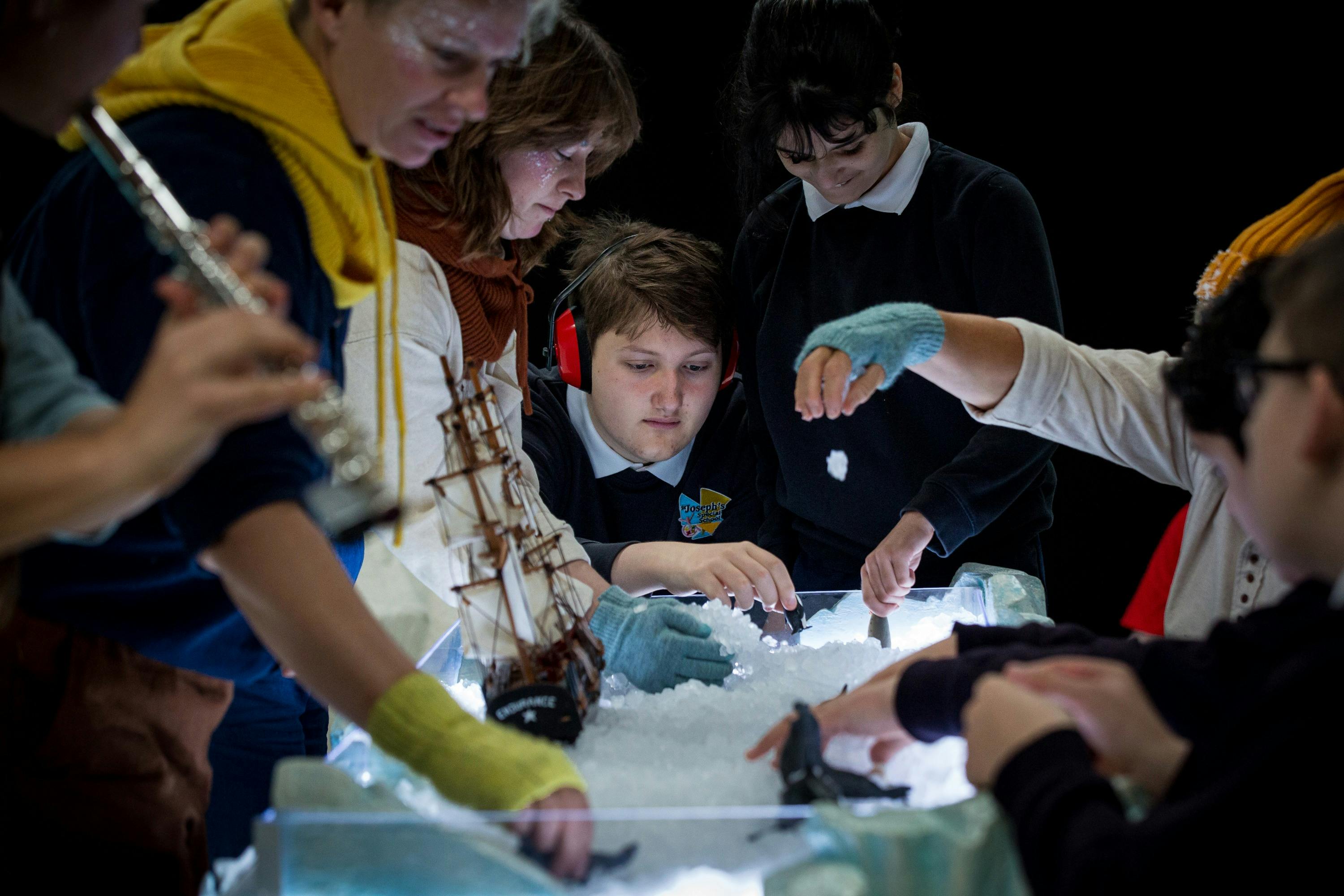 An image of audience members taking part in the Antarctica show