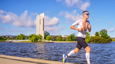 Professional athlete Kurt McDonald on run leg Challenge Canberra 2023