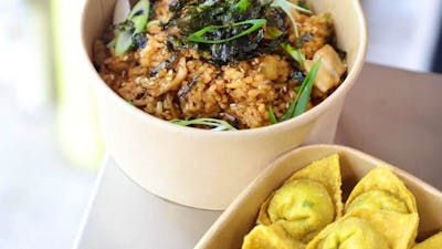 Fried rice and wontons in takeaway containers