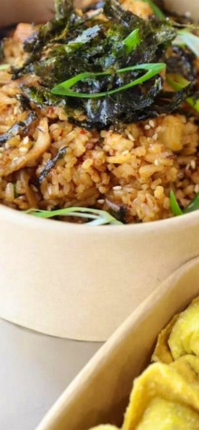Fried rice and wontons in takeaway containers
