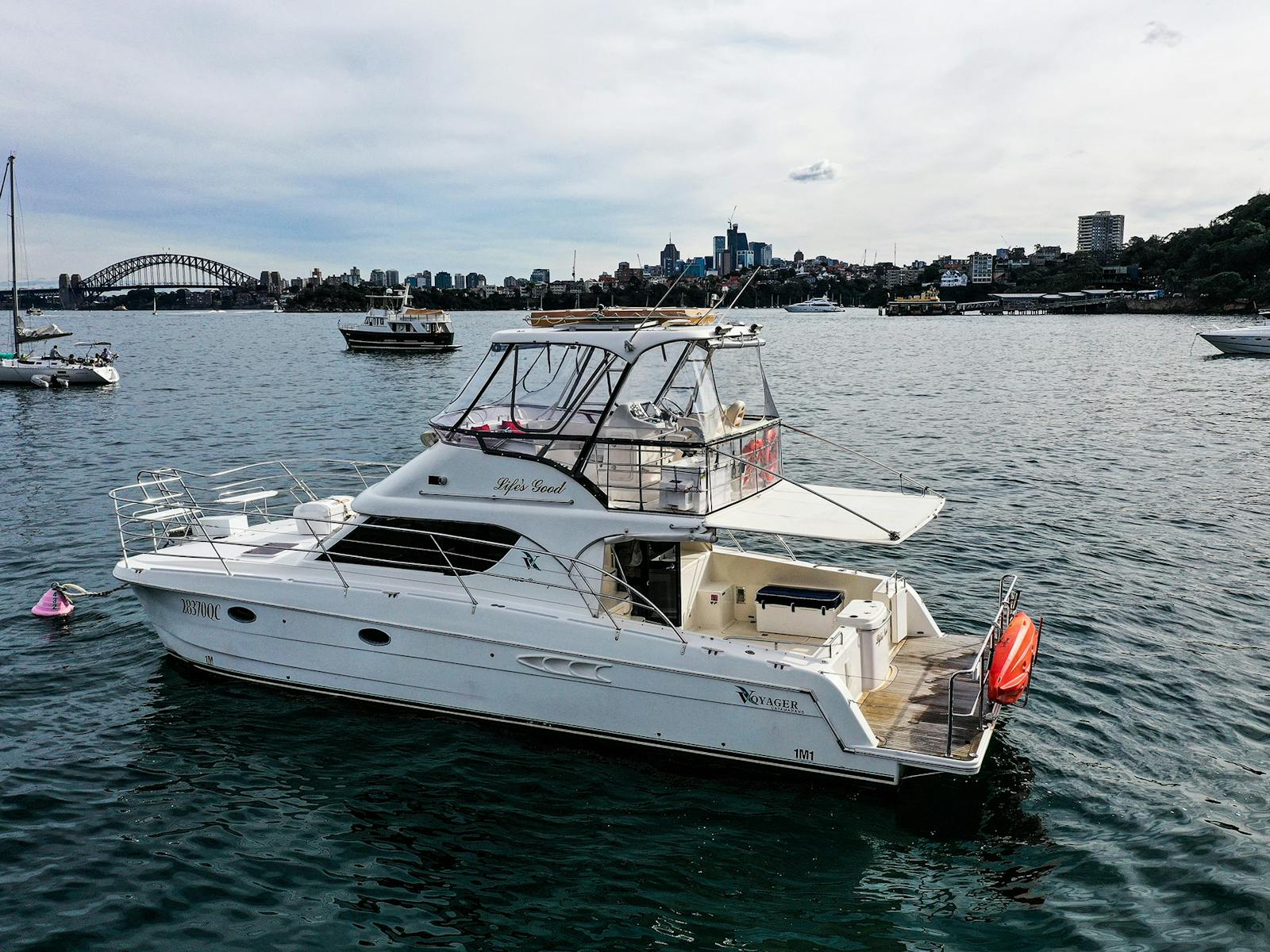 Sydney Harbour charter swimming and enjoying the Sydney Harbour Bridge