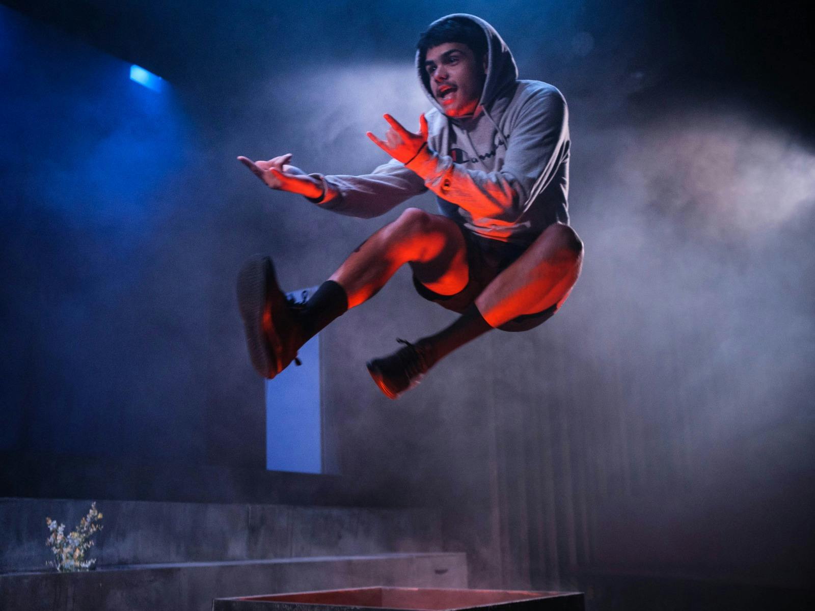 young adult jumping
