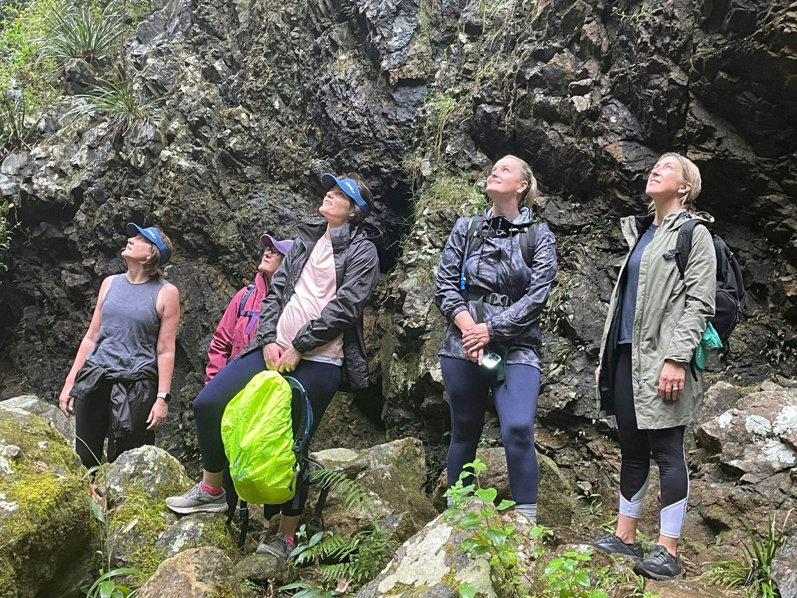 Refelcting on the natural surroundings at a waterfall