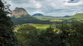 View of moutnains and farmland from Mount Ngungun