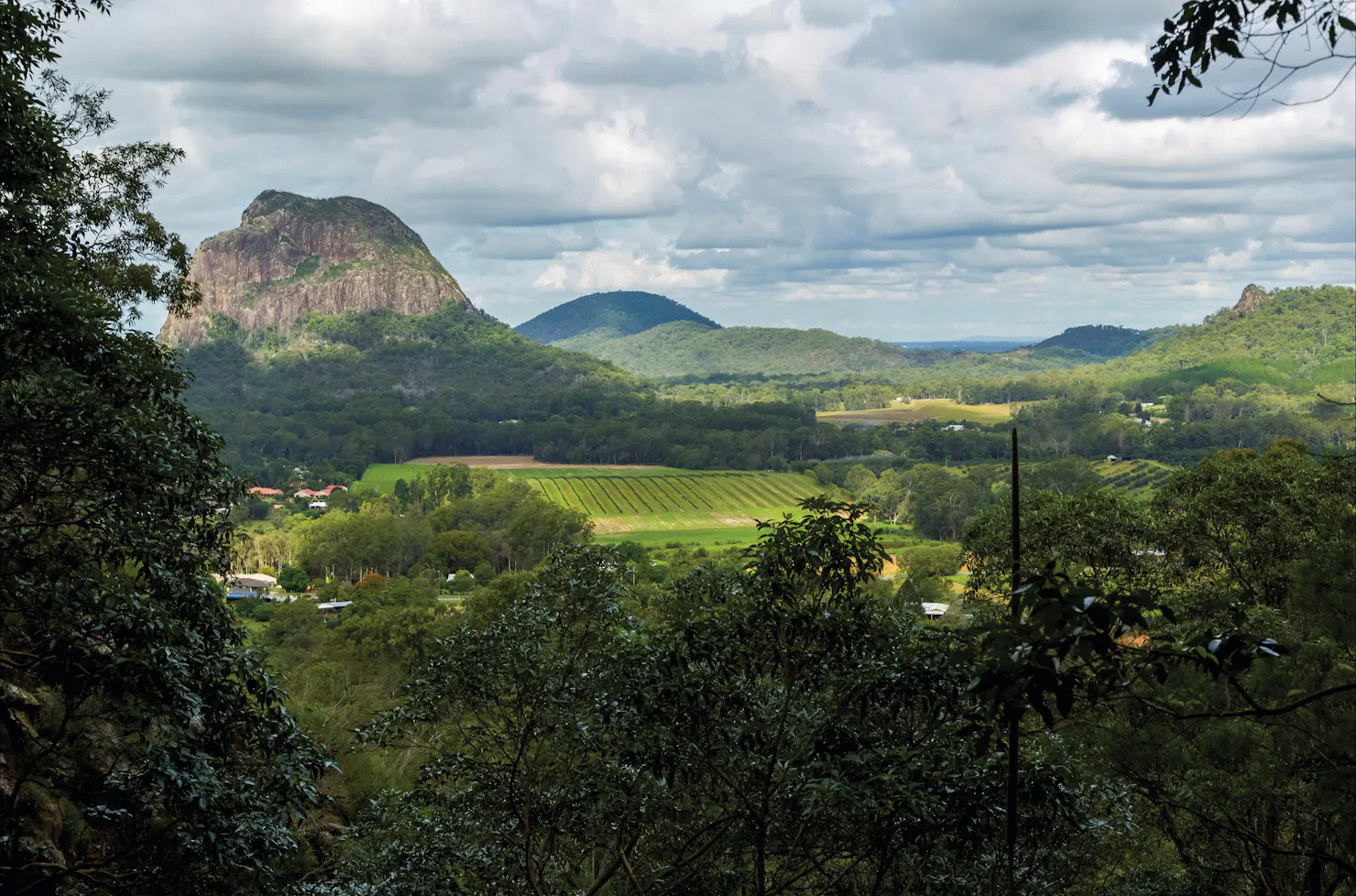 View of moutnains and farmland from Mount Ngungun