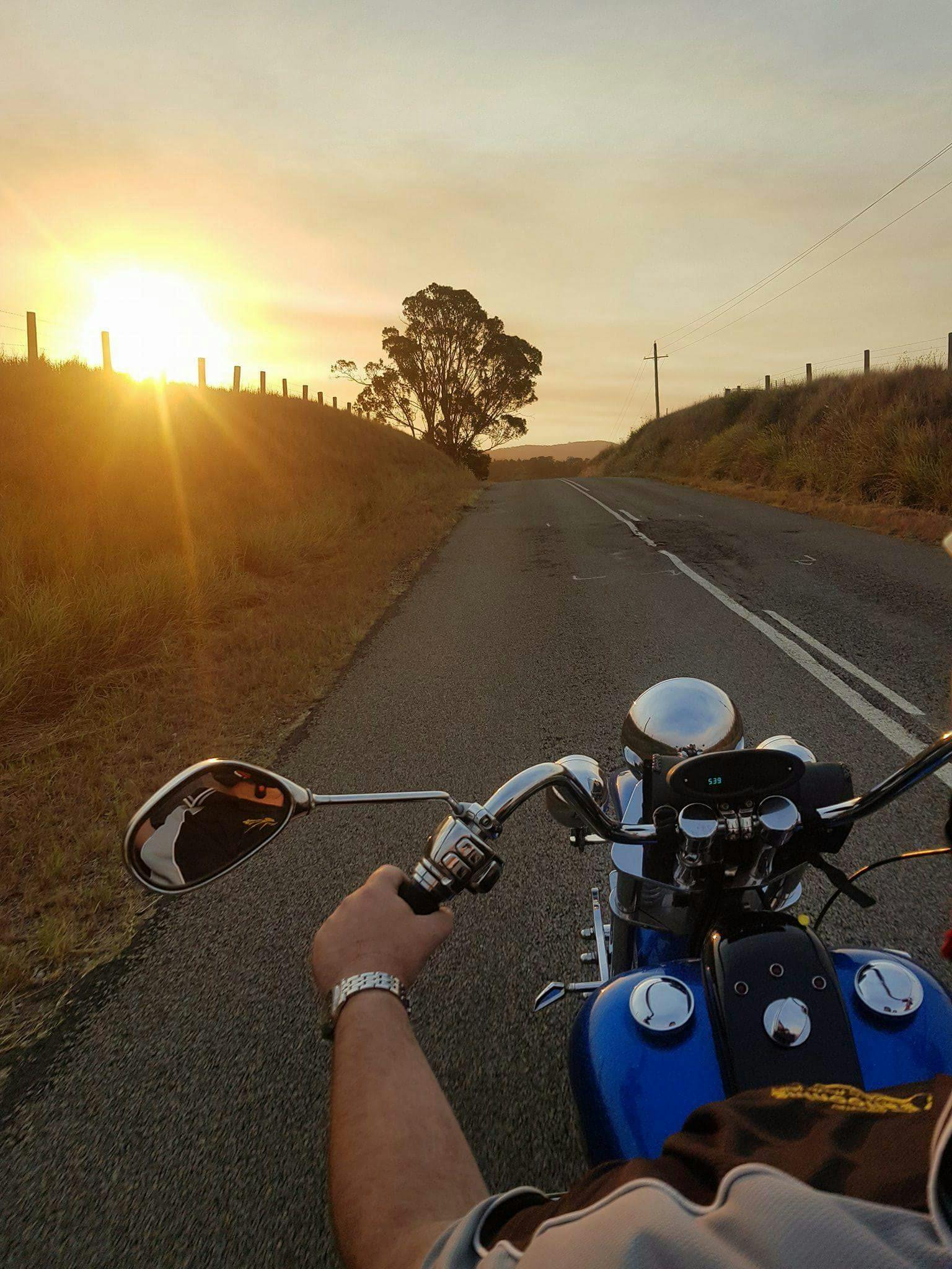 on the trike at sunset