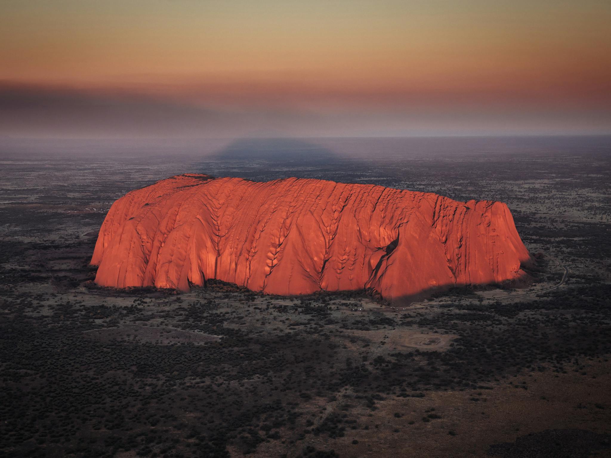 Uluru at sunrise from a helicopter tour