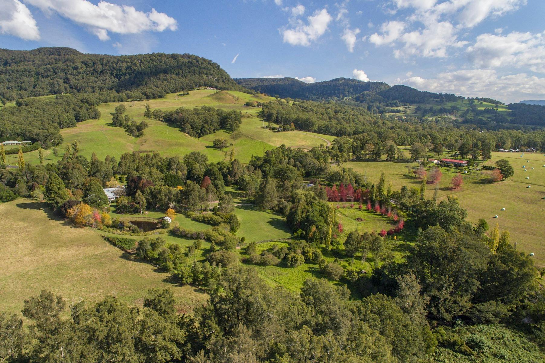 Aerial shot of the property with escarpment in the background.