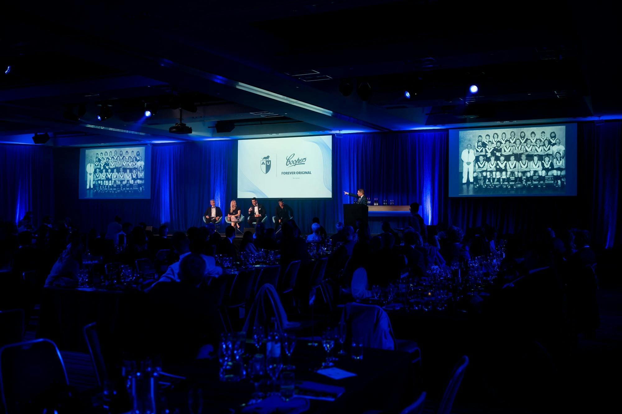 Panellists speak at the 125 Years Gala Dinner.