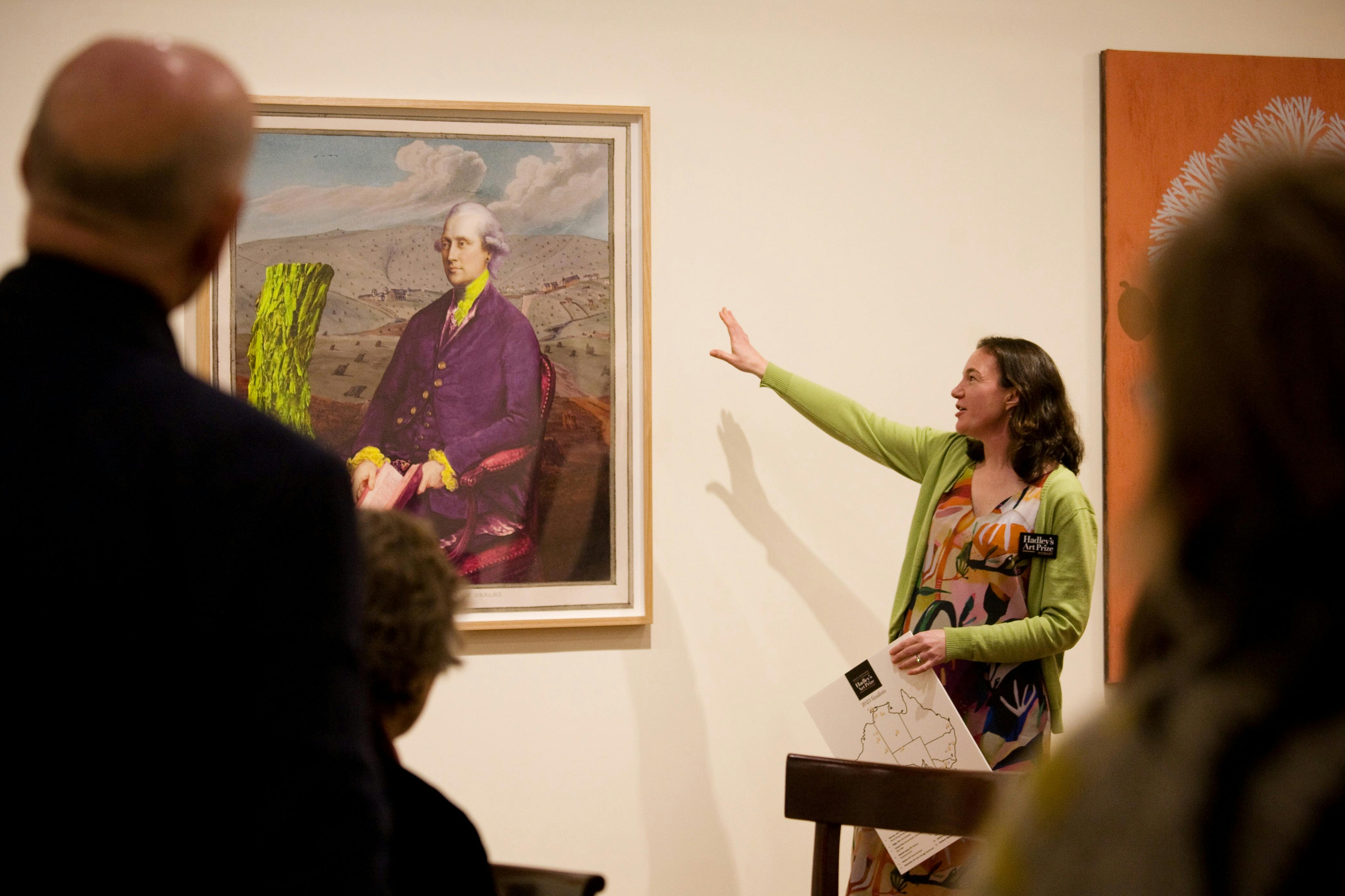 Dr Amy Jackett taking and exhibition tour group through Hadley's Art Prize