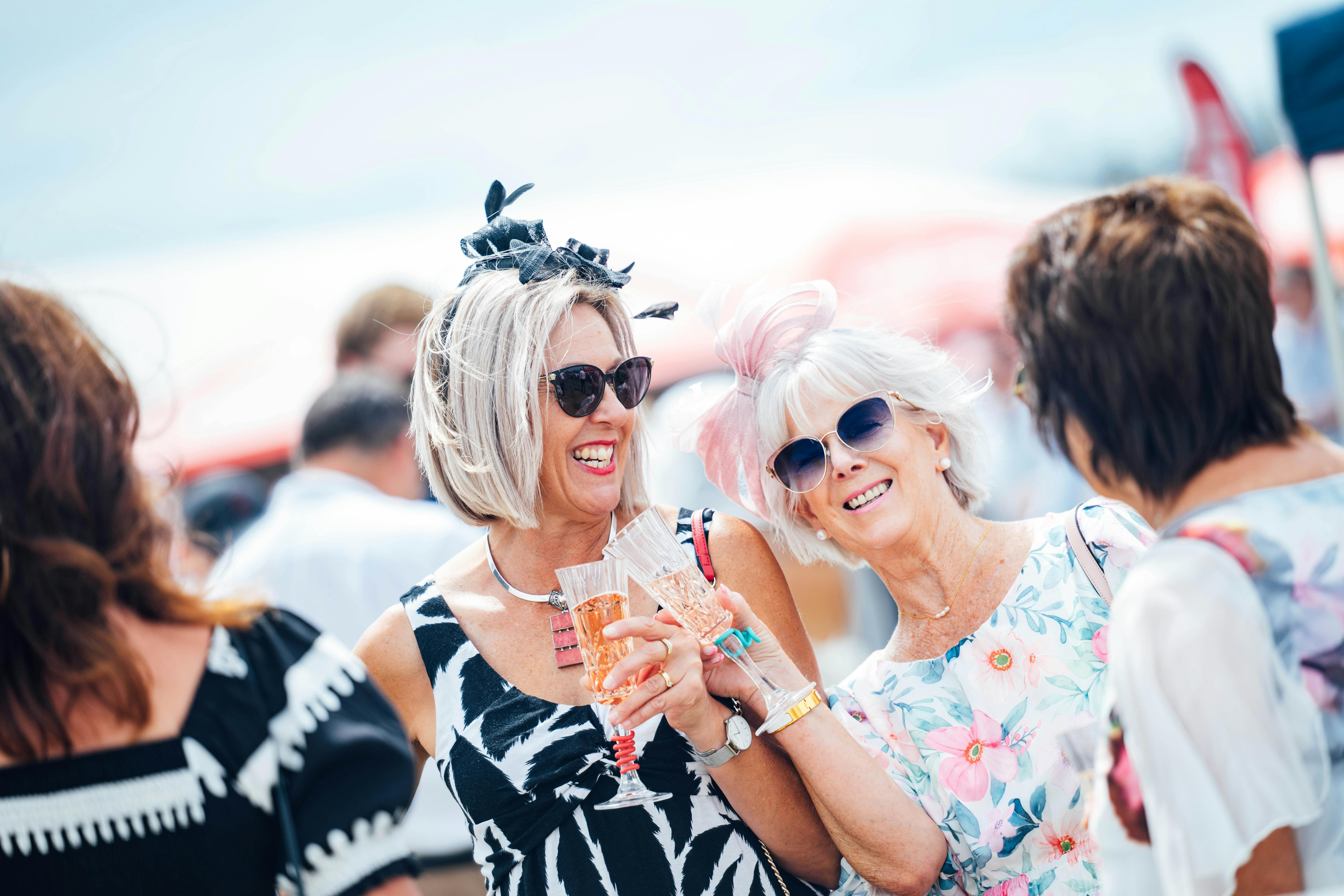 Women smiling in cup wear