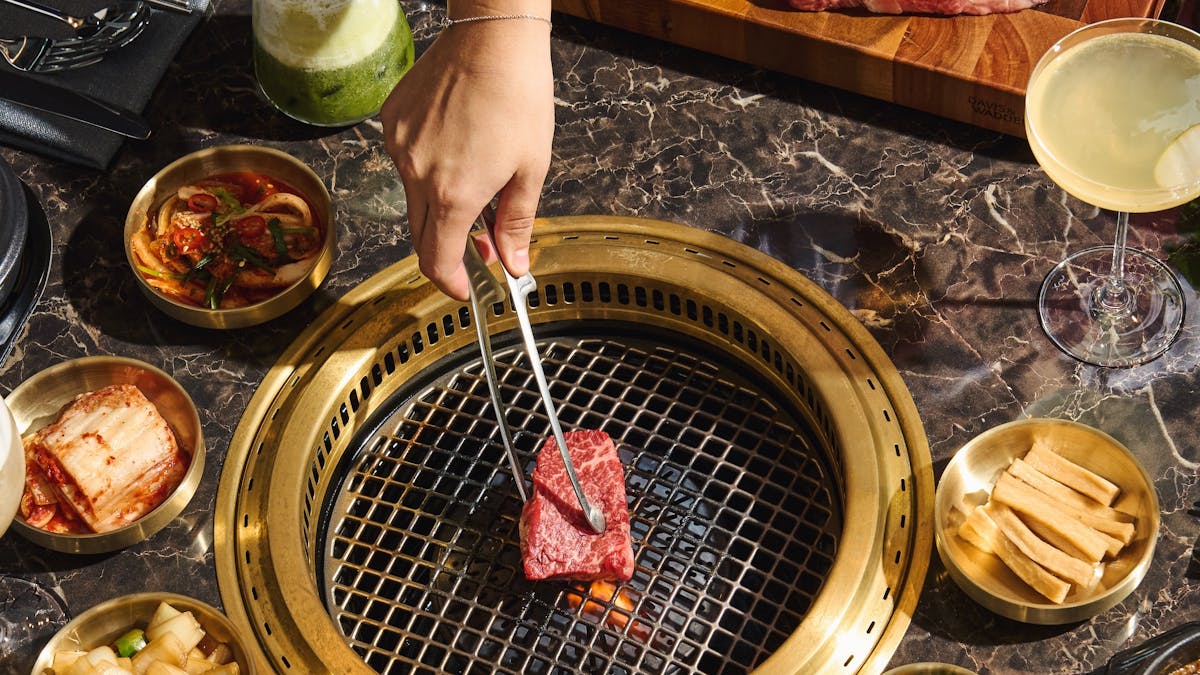 Four cuts of meat on a chopping board Four cuts of meat on a chopping board