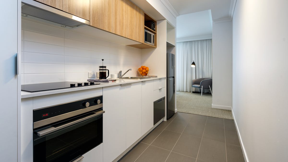 Cook-up a storm in this very spacious kitchen. Featuring an oven, cooktop, dishwasher and fridge.