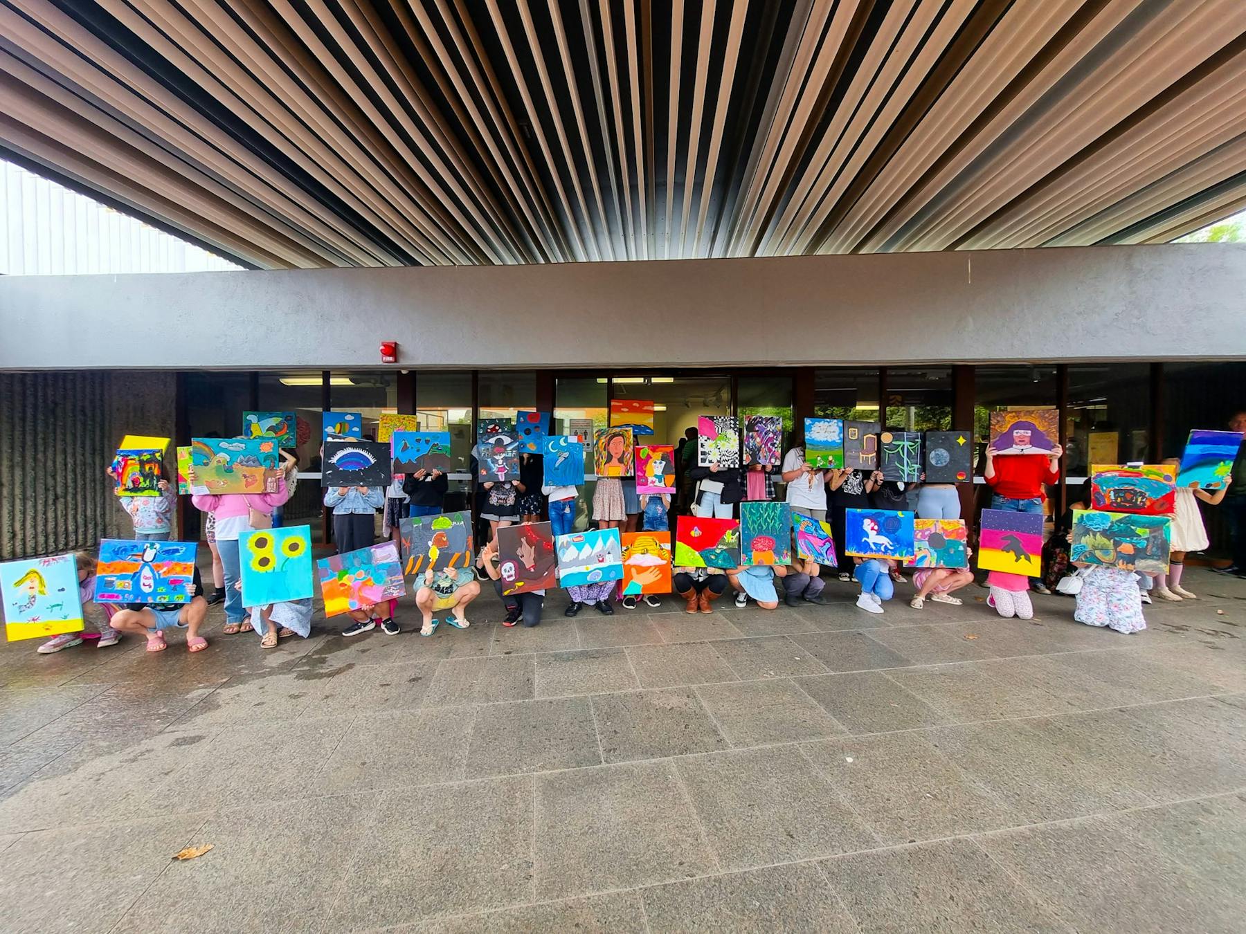 Primary & Secondary students at their annual student exhitition displaying their work