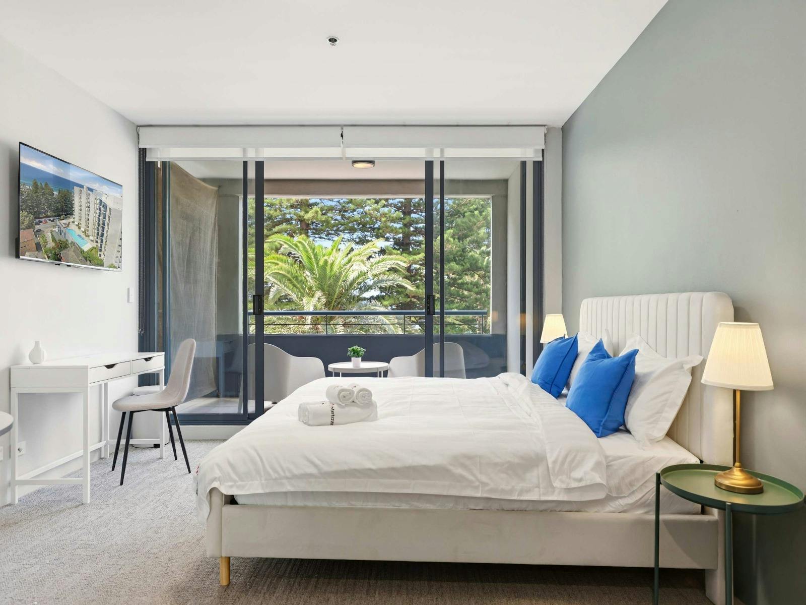 Bedroom with balcony access