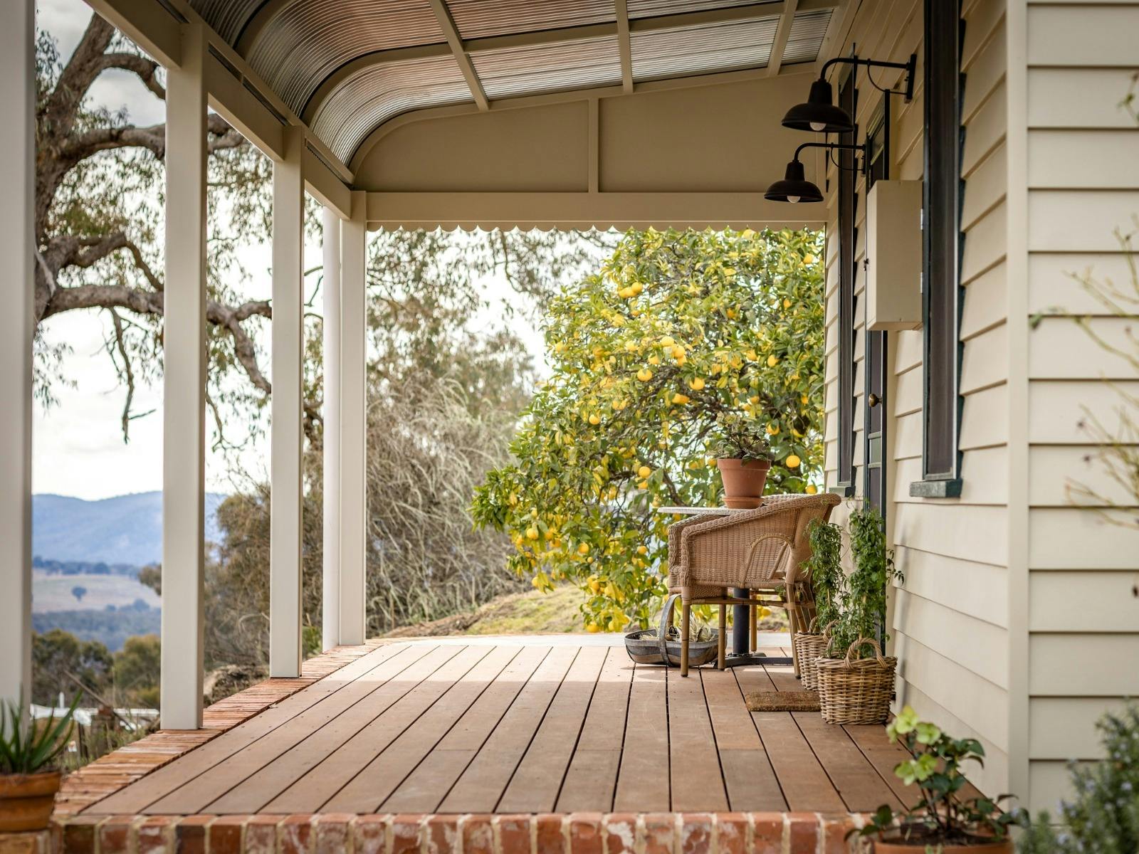 Outside area features a barbecue, rustic fire pit, and patio spa.