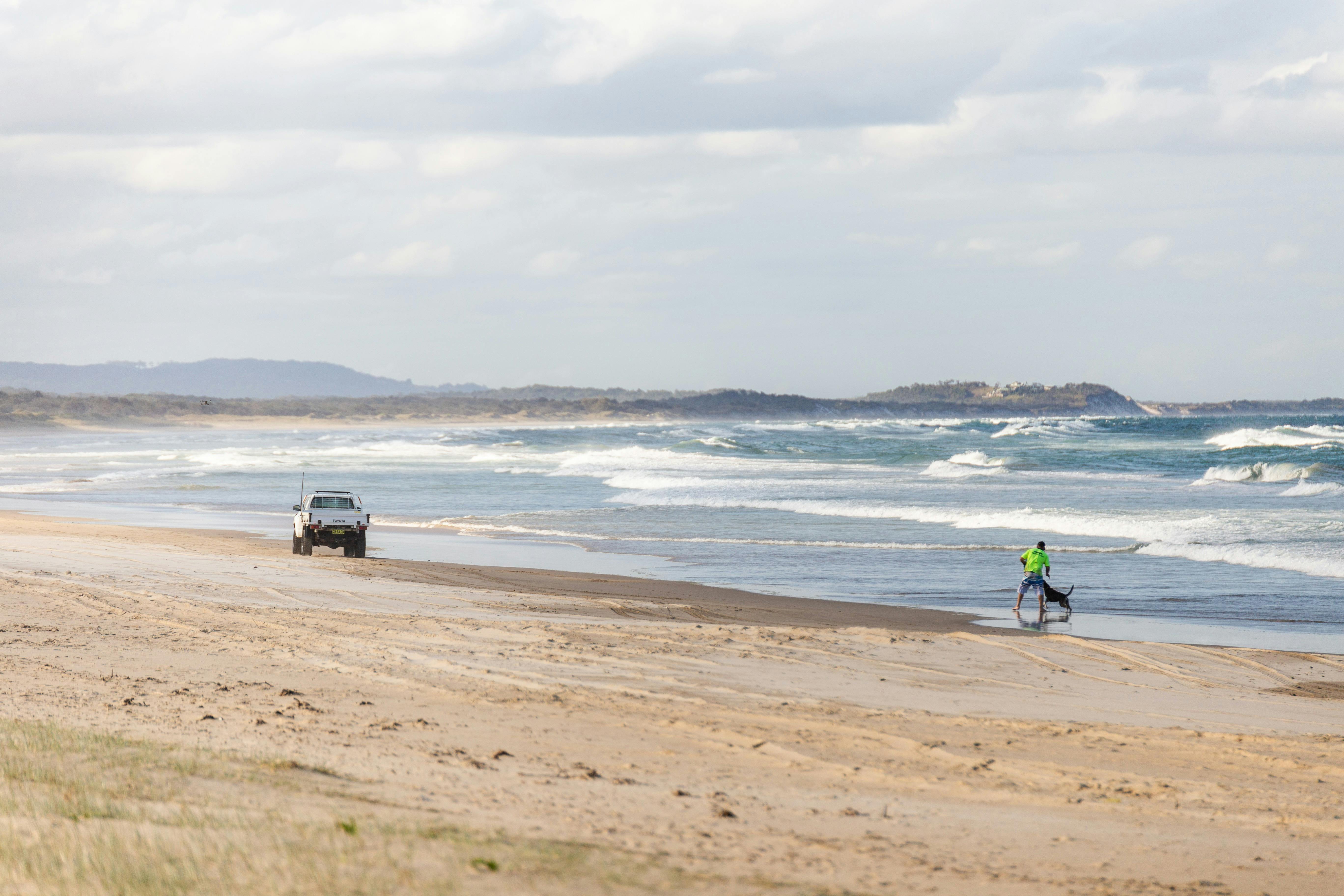 Ute and fisherman on beach