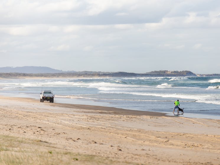 Ute and fisherman on beach