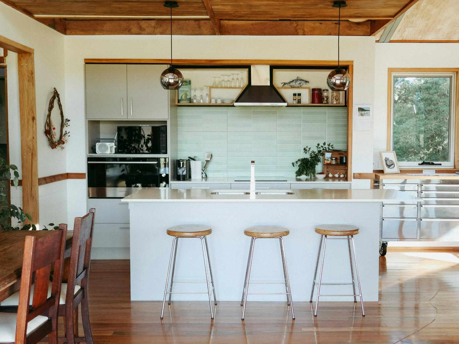 The kitchen is light and modern