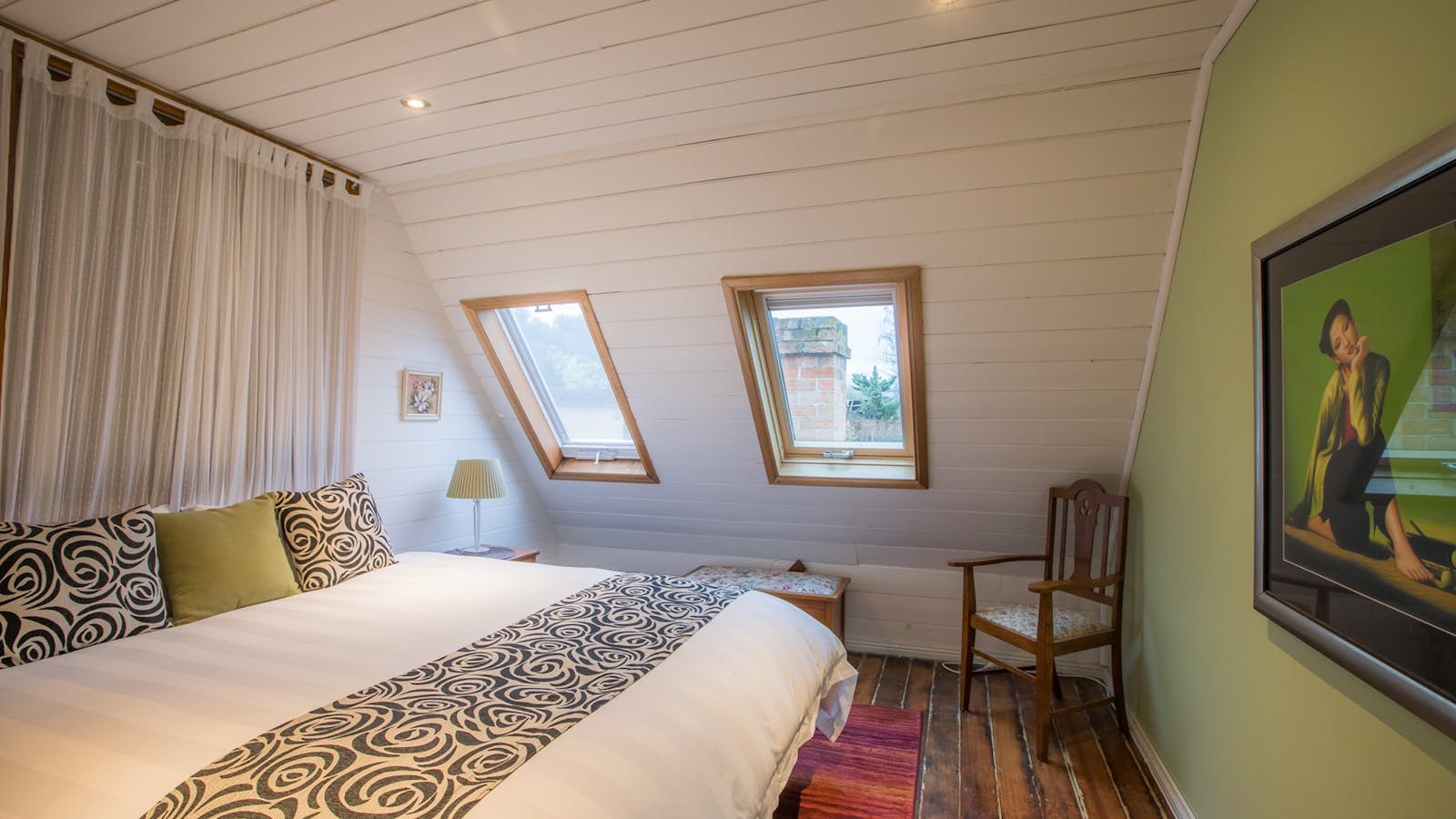 The Main bedroom is on the mezzanine level and has a King size bed
