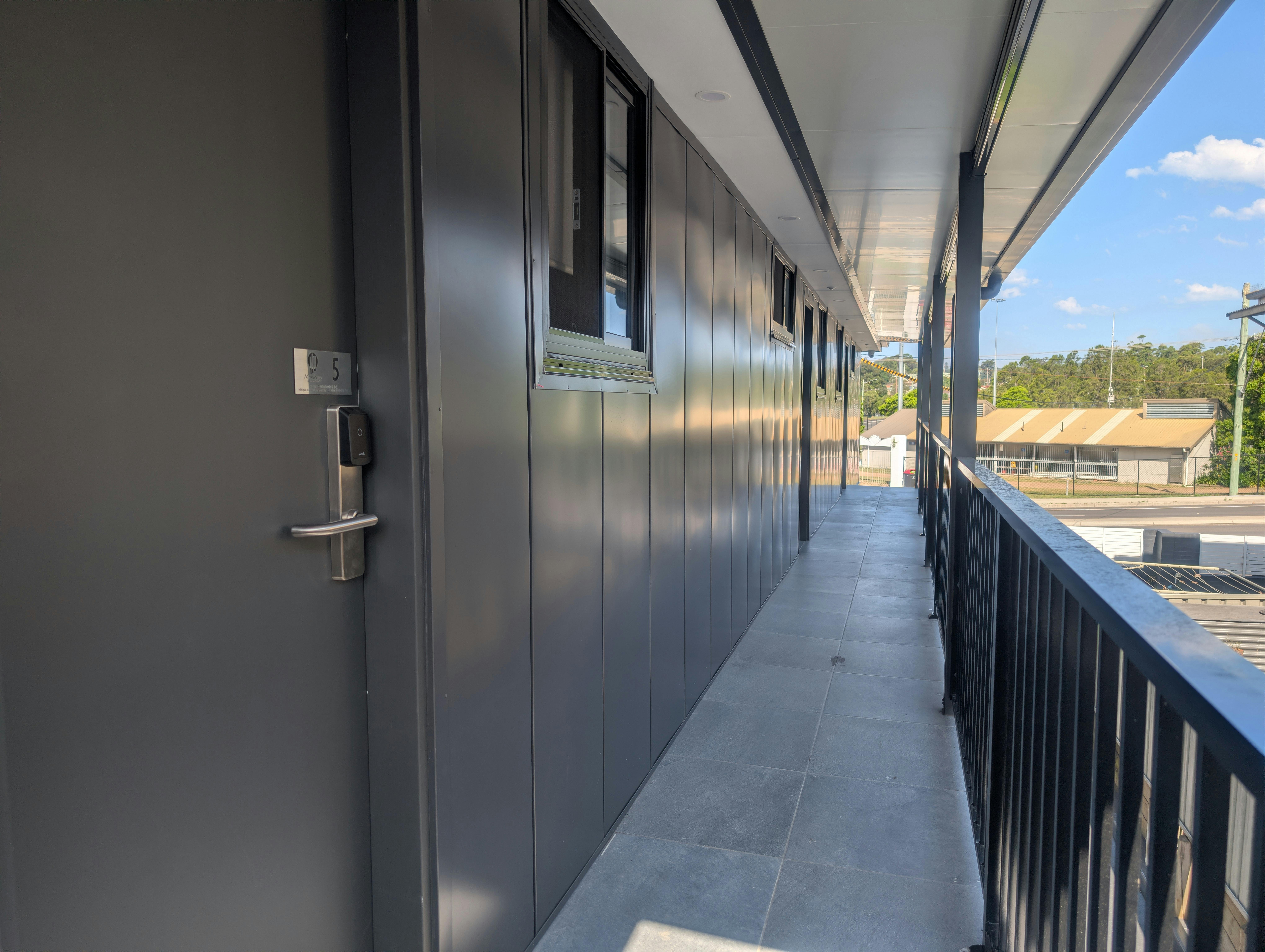 The Walkway up the stairs used to access the One Bedroom With balcony Apartments.