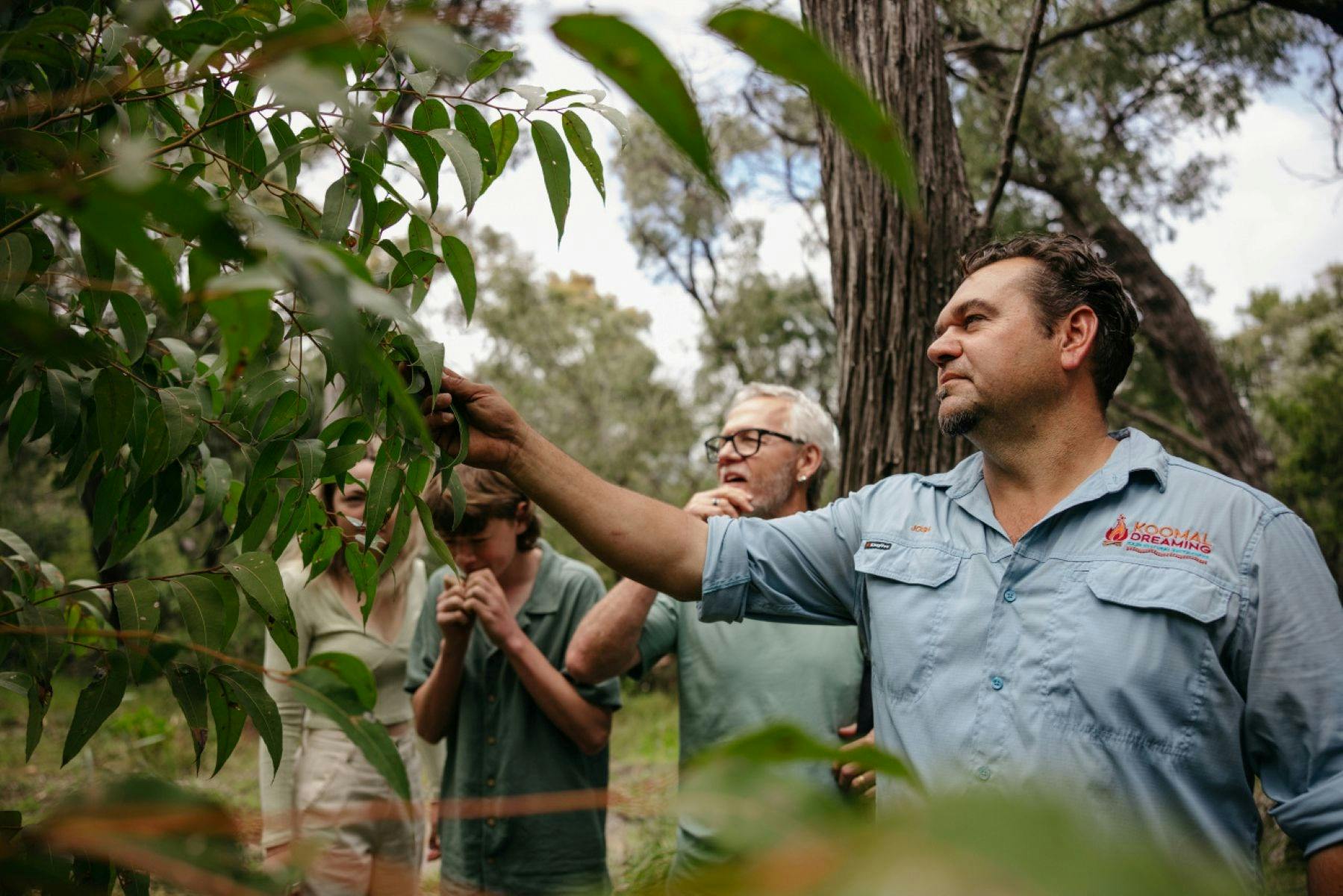 Guide showing visitors plants
