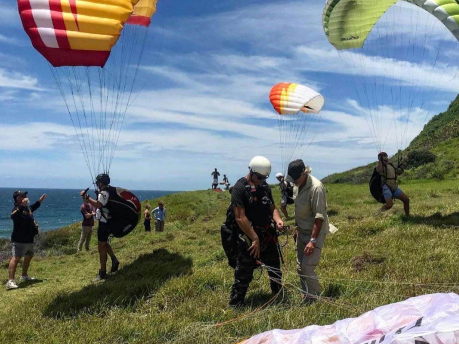 people having a paragliding lesson on Lennox Point