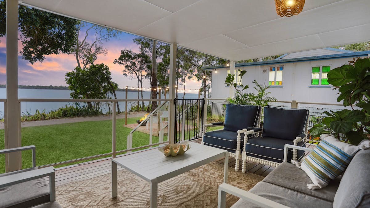 Covered veranda with river views