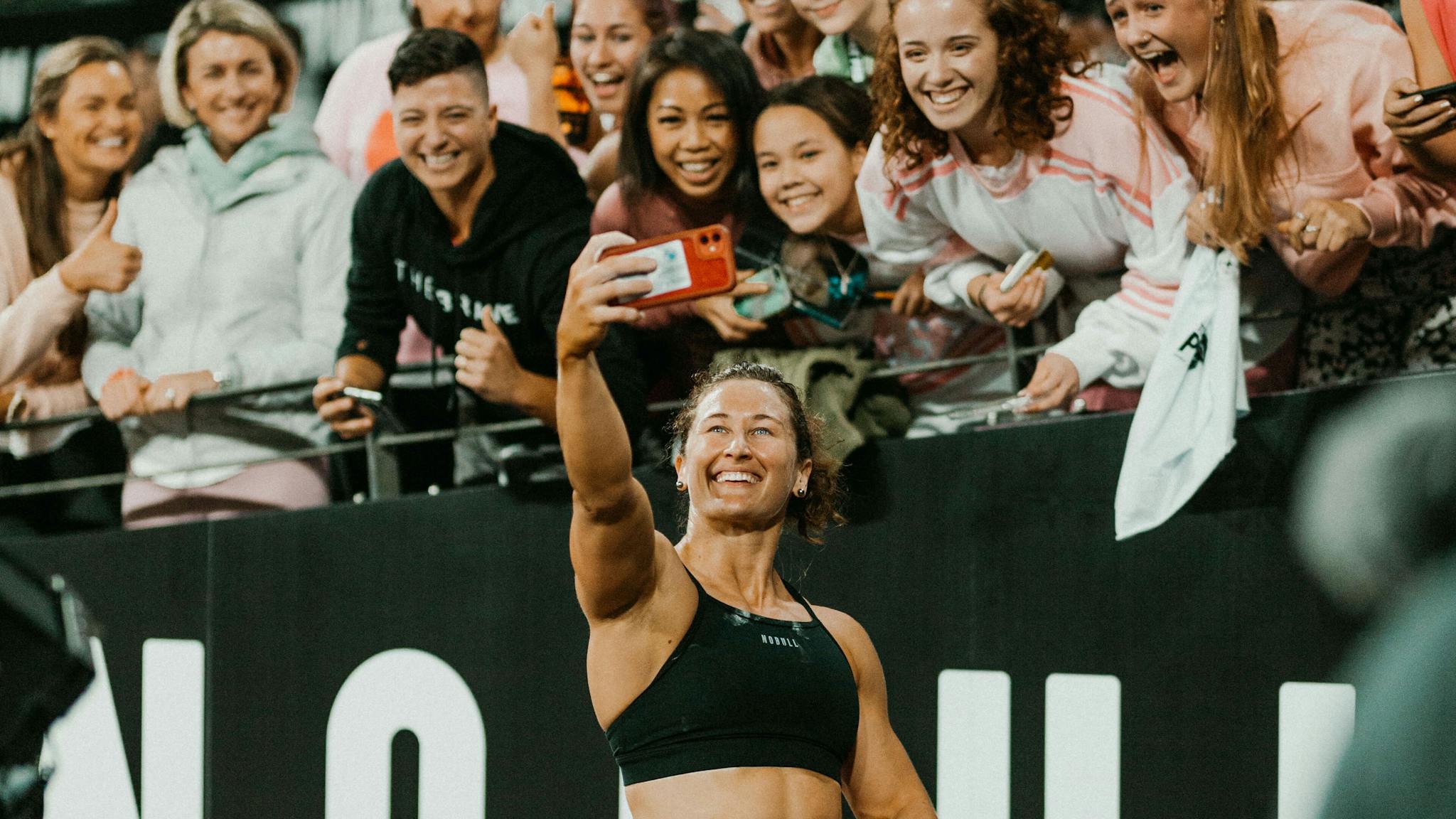 Tia-Clair Toomey gets a selfie with fans