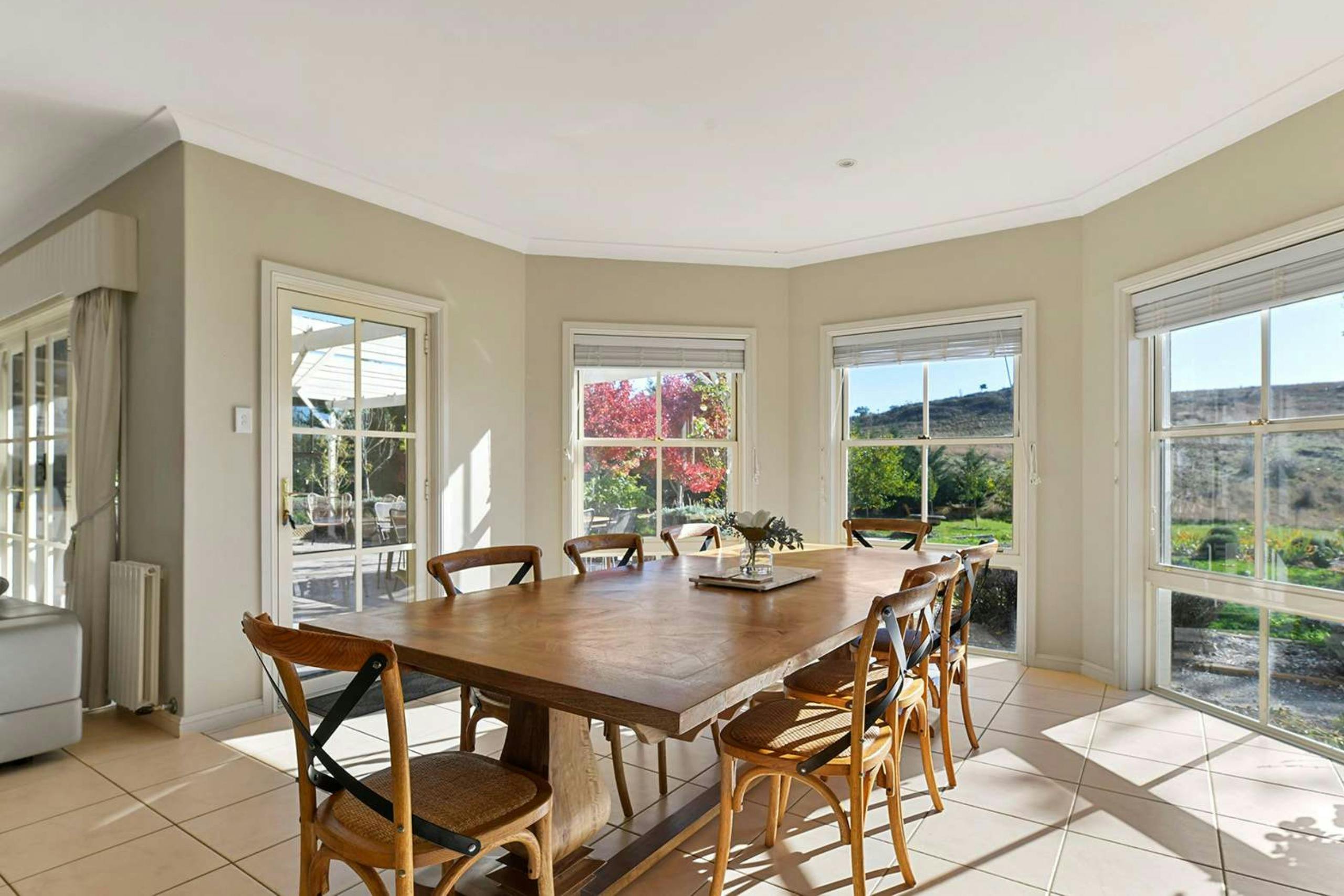 Dining table and chairs at Book Regionals Luxe Countryside home for the spanish table