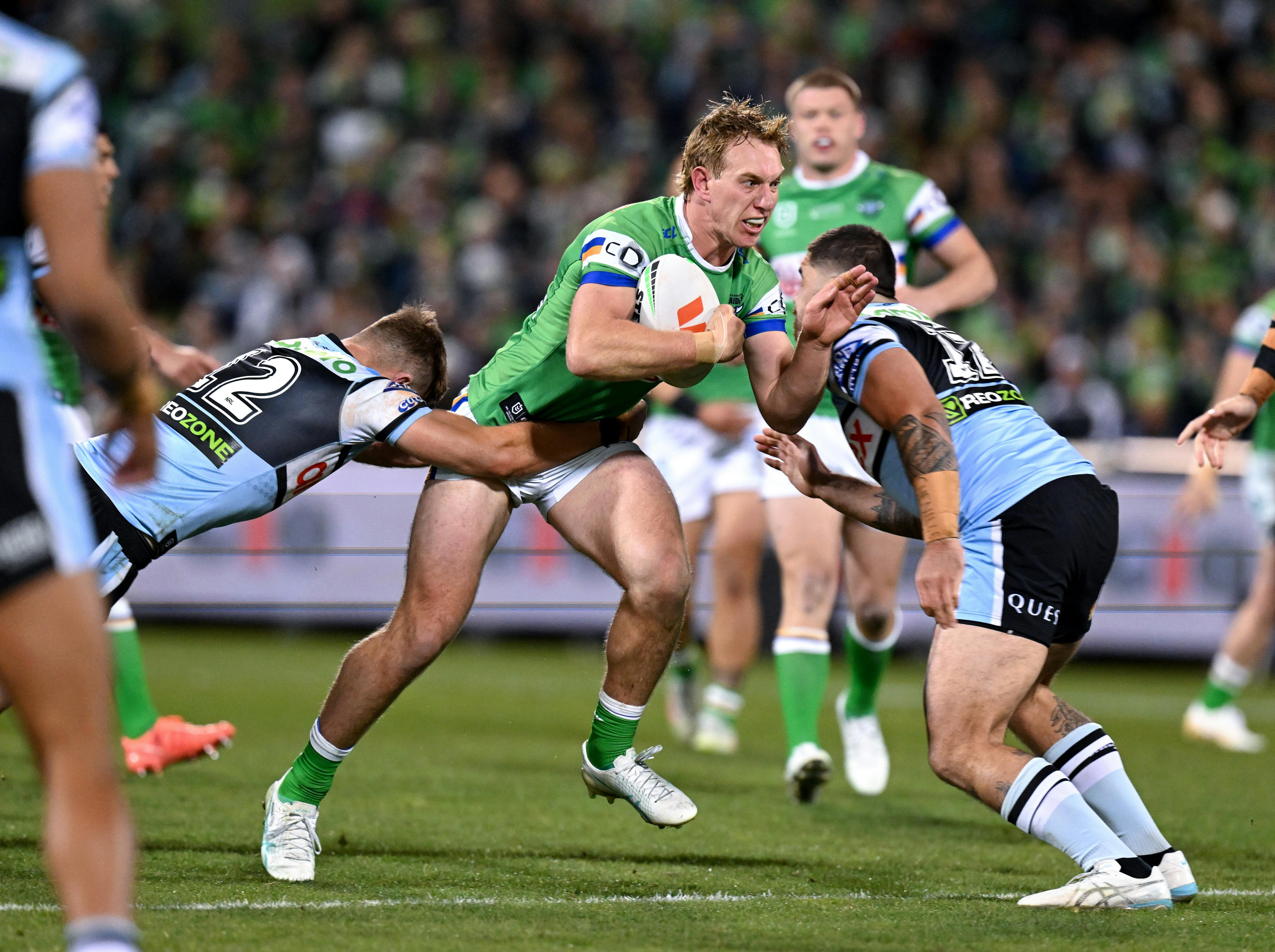 Canberra Raiders player Zac Hosking running the ball.