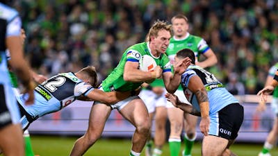 Canberra Raiders player Zac Hosking running the ball.