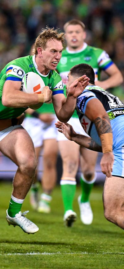Canberra Raiders player Zac Hosking running the ball.