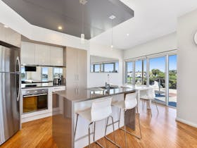 Breakfast bar and full size kitchen