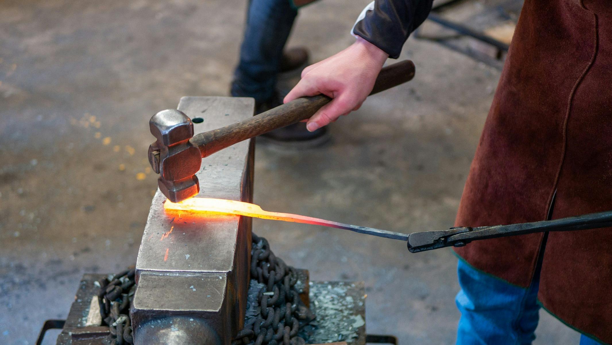 Hammer hitting hot steel