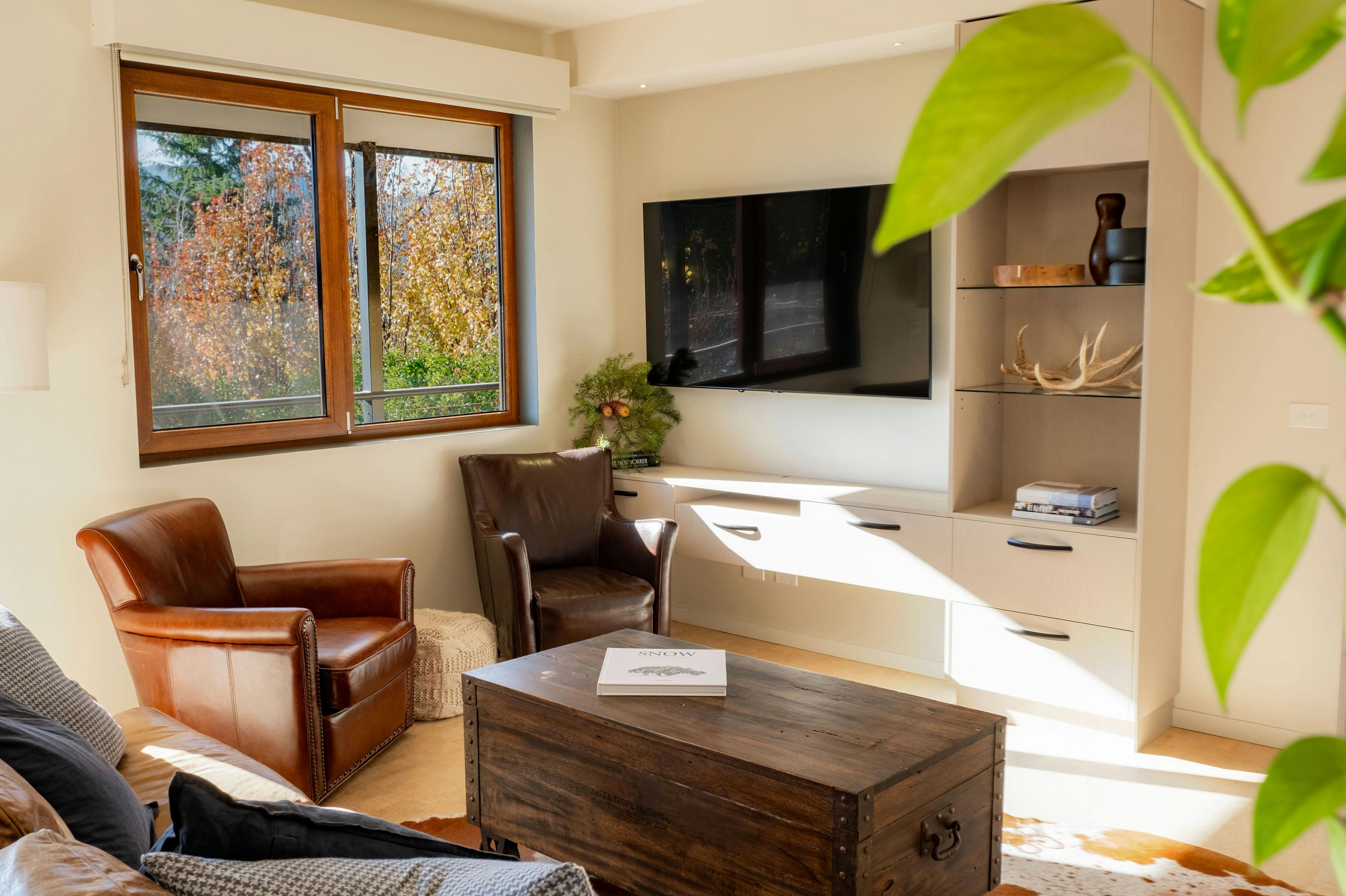 chairs, tea table and television in the 25 walkers lane lounge room
