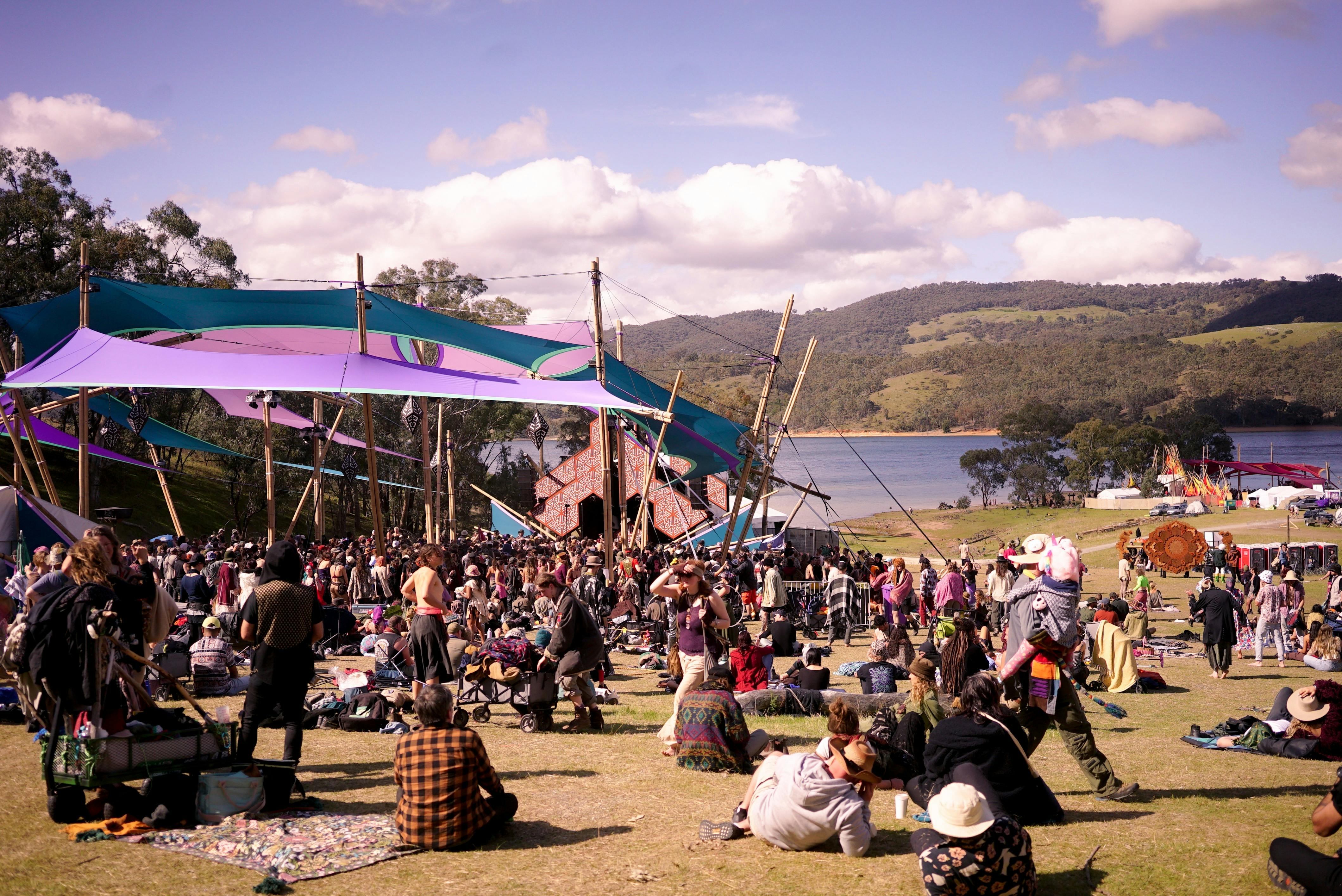 Patrons relaxing to music and a beautiful view.