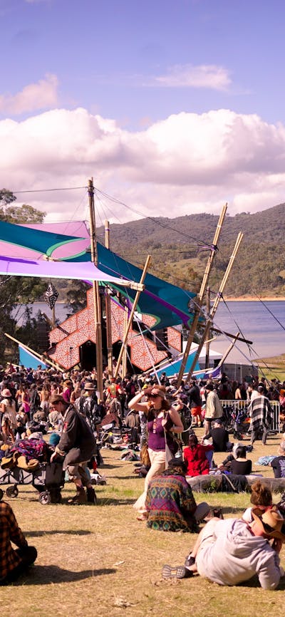 Patrons relaxing to music and a beautiful view.