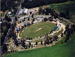 Bird eye view of the Walbundrie Show, rides tents, animals and people can be seen.