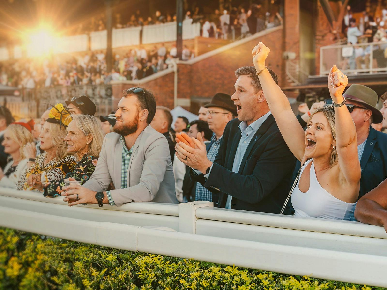 Crowd cheering at Eagle Farm Racecourse