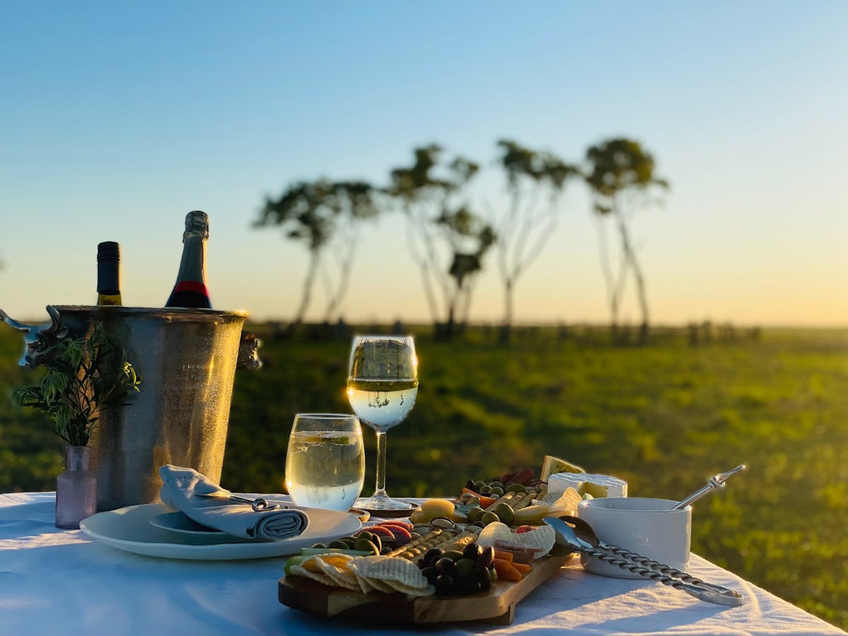 Sunset drinks and canapes at 'Boot Hill' cemetery, Darr River Downs, Longreach Queensland
