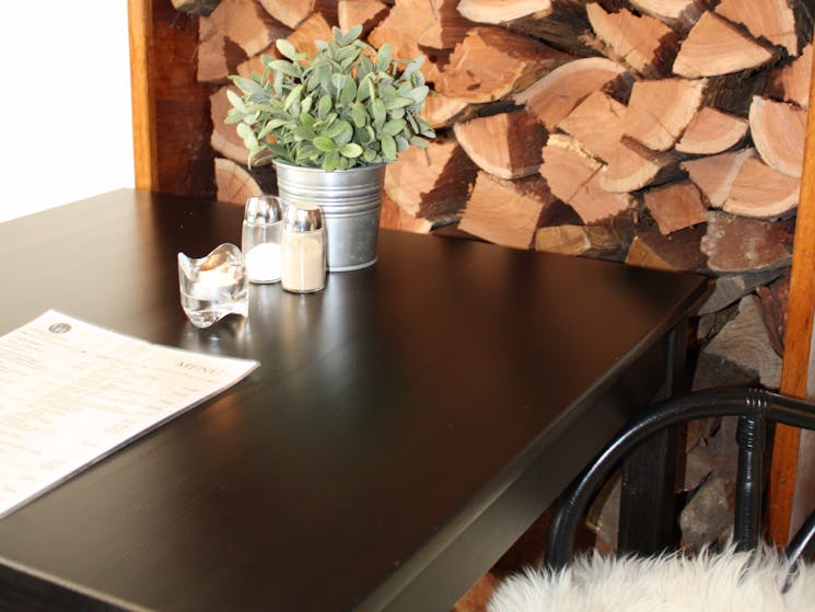 Wood pile near table